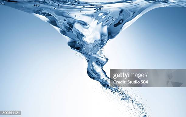 blue vortex in water - vortex stock pictures, royalty-free photos & images