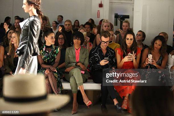 Jessica Lowndes, Michelle Williams, Brad Goreski and Louise Roe sit front row at the Marissa Webb fashion show during New York Fashion Week at The...