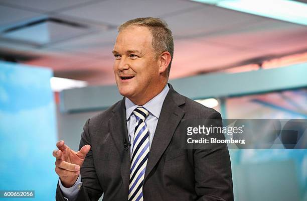 Charlie Young, president and chief executive officer of Coldwell Banker Real Estate, speaks during a Bloomberg Television interview in New York,...
