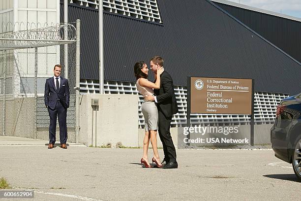 The Hand That Feeds You" Episode 609 -- Pictured: Gabriel Macht as Harvey Specter, Meghan Markle as Rachel Zane, Patrick J. Adams as Michael Ross --