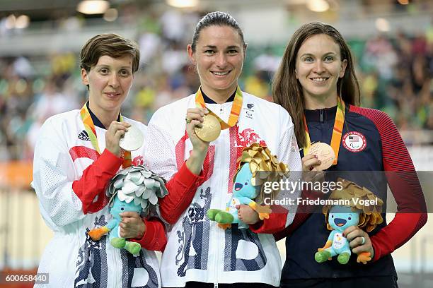 Silver medalist Crystal Lane of Great Britain, gold medalist Sarah Storey of Great Britain and bronze medalist Samantha Bosco of the United States...