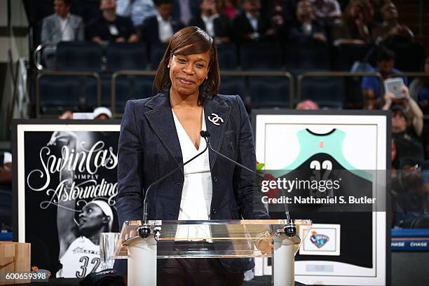 Former WNBA player Tina Thompson speaks during the retirement ceremony for Swin Cash of the New York Liberty after the game against the Seattle Storm...