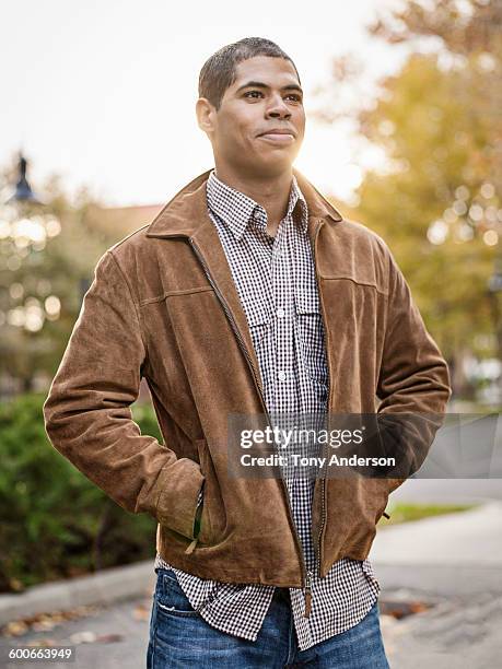portrait of young man outdoors - jacket stock pictures, royalty-free photos & images