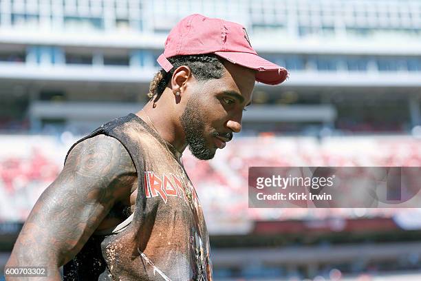 Former Ohio State Buckeyes player Braxton Miller of the Houston Texans walks around the field prior to the start of the game between the Ohio State...