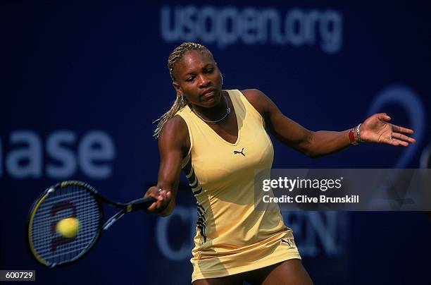 Serena Williams of the USA hits the ball the match against Martina Sucha of the Slovak Republic for the US Open at the UATA National Tennis Center in...