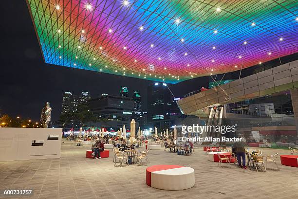 cafe of the busan cinema center at night - skyscraper film stock pictures, royalty-free photos & images