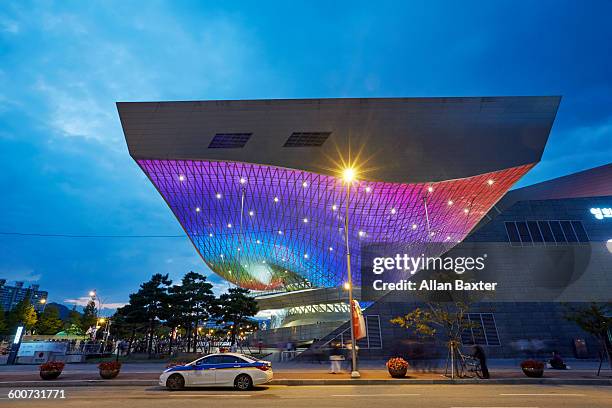 facade of busan cinema center at night - busan stock pictures, royalty-free photos & images