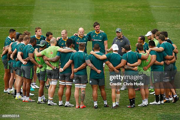 Michael Cheika talks to players during the Australian Wallabies captain's run at Ballymore Stadium on September 9, 2016 in Brisbane, Australia.