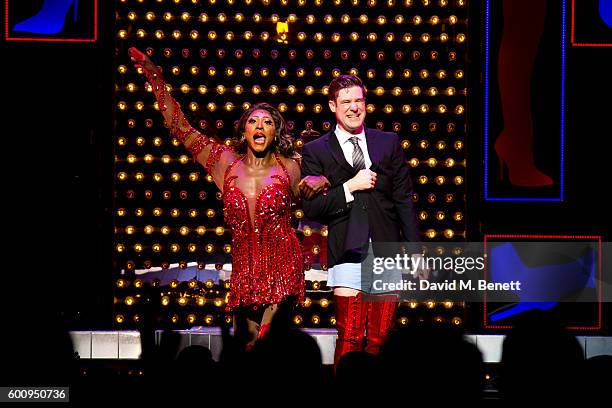 Matt Henry and David Hunter bow at the curtain call during the 1st birthday performance of "Kinky Boots" at Adelphi Theatre on September 8, 2016 in...