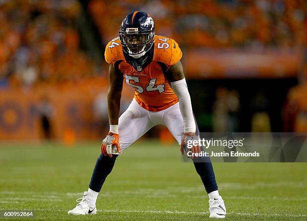 Inside linebacker Brandon Marshall of the Denver Broncos looks on in the first half against the Carolina Panthers at Sports Authority Field at Mile...