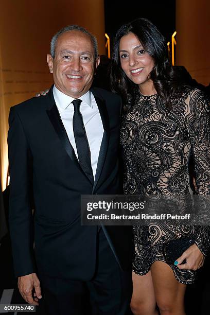 Nassef Sawiris and his wife Sherine attend the 28th Biennale des Antiquaires : Pre-Opening at Grand Palais on September 8, 2016 in Paris, France.