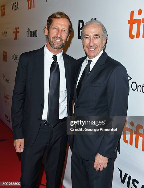 Of Anchorage Capital Group Kevin Ulrich and CEO of Metro-Goldwyn-Mayer Gary Barber attend "The Magnificent Seven" premiere during the 2016 Toronto...