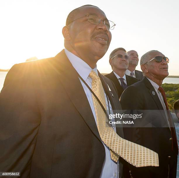 In this handout photo provided by NASA, NASA Deputy Associate Administrator Gregory Robinson, left, Director of NASA's Kennedy Space Center Robert...