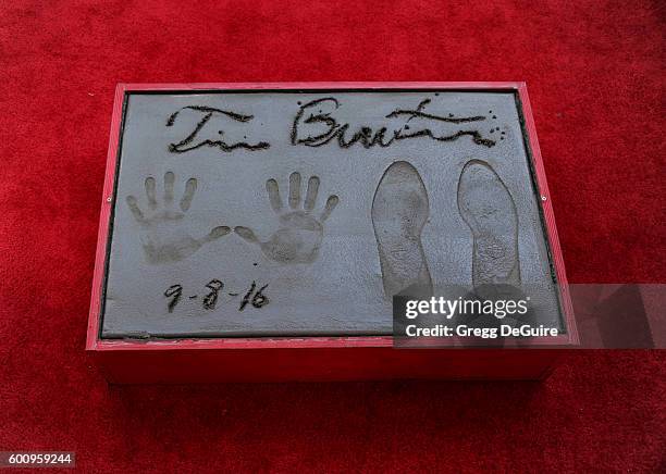 Director Tim Burton attends his Hand And Footprint Ceremony at TCL Chinese 6 Theatres on September 8, 2016 in Hollywood, California.