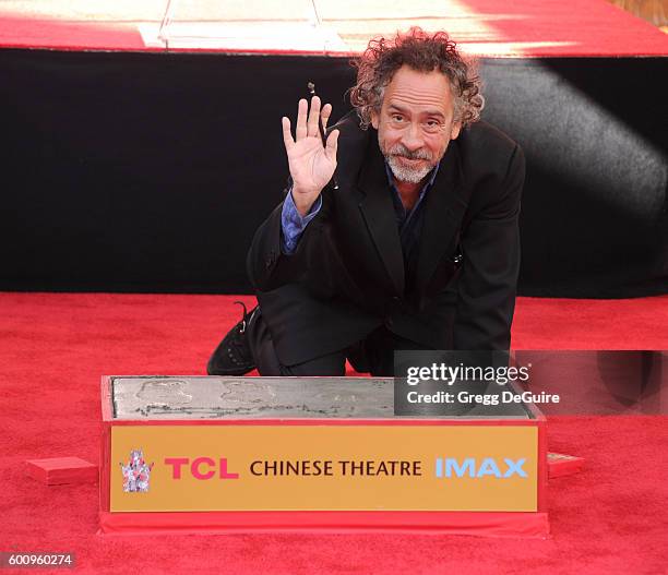 Director Tim Burton attends his Hand And Footprint Ceremony at TCL Chinese 6 Theatres on September 8, 2016 in Hollywood, California.