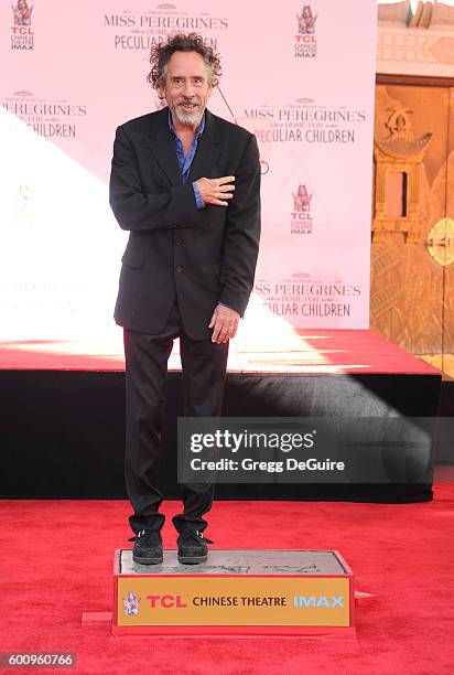 Director Tim Burton attends his Hand And Footprint Ceremony at TCL Chinese 6 Theatres on September 8, 2016 in Hollywood, California.