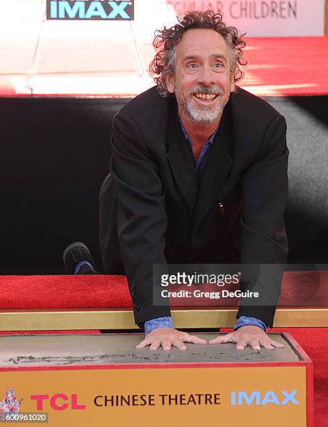 Director Tim Burton attends his Hand And Footprint Ceremony at TCL Chinese 6 Theatres on September 8, 2016 in Hollywood, California.