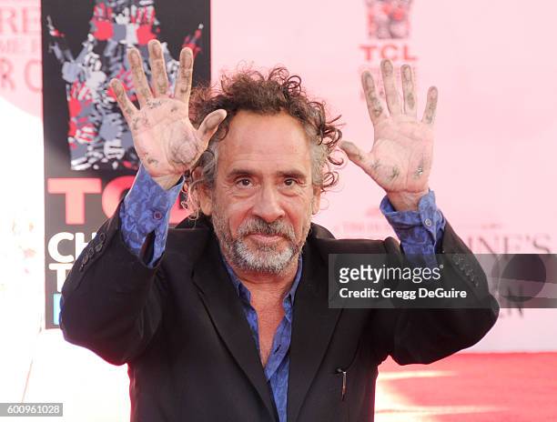 Director Tim Burton attends his Hand And Footprint Ceremony at TCL Chinese 6 Theatres on September 8, 2016 in Hollywood, California.
