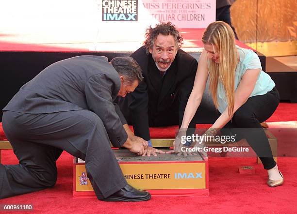 Director Tim Burton attends his Hand And Footprint Ceremony at TCL Chinese 6 Theatres on September 8, 2016 in Hollywood, California.