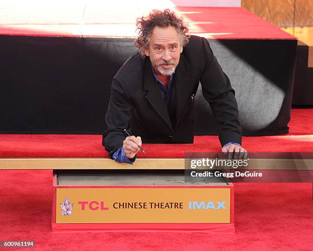 Director Tim Burton attends his Hand And Footprint Ceremony at TCL Chinese 6 Theatres on September 8, 2016 in Hollywood, California.