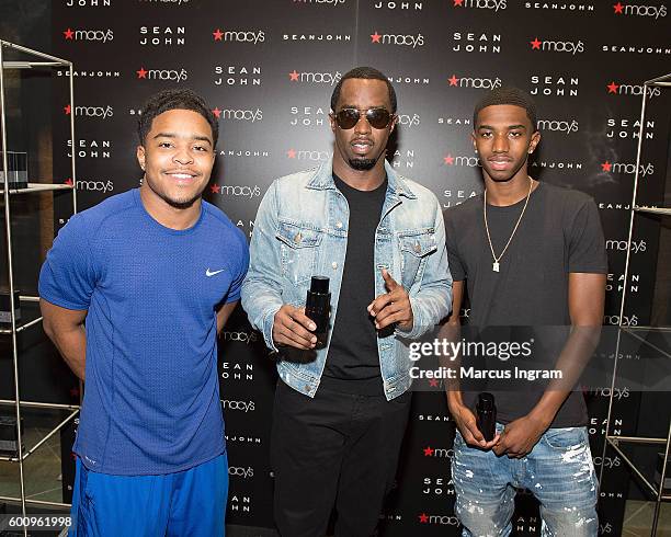 Justin Combs, Sean "Diddy" Combs, and Christian "King" Combs arrive at Macy's to premier Sean John new fragrance launch at Macy's Lenox Square on...