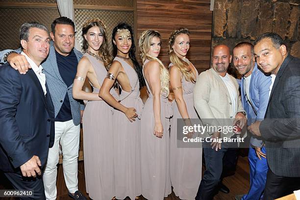 Guests and Avra models attend the Avra Madison grand opening party on September 8, 2016 in New York City.