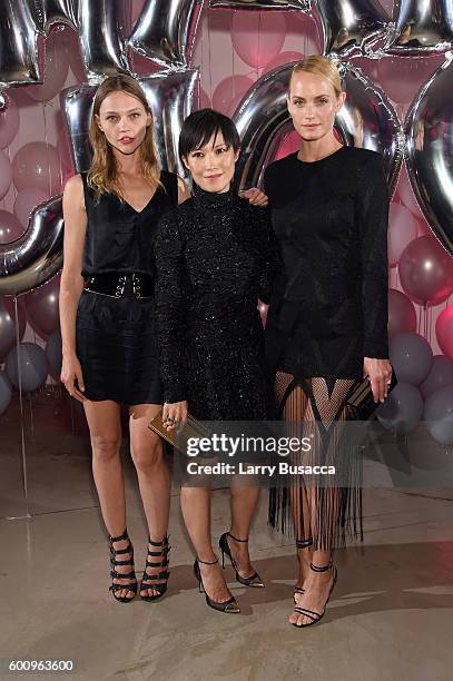 Sasha Pivovarova, Jimmy Choo Creative Director Sandra Choi, and Amber Valletta attend the Jimmy Choo 20th Anniversary Event during New York Fashion...