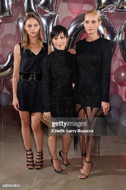 Sasha Pivovarova, Jimmy Choo Creative Director Sandra Choi, and Amber Valletta attend the Jimmy Choo 20th Anniversary Event during New York Fashion...