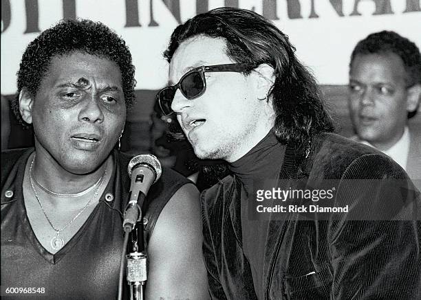 Singer/Songwriter Aaron Neville and U2's Bono attend a press conference discussing The Conspiracy of Hope tour celebrating Amnesty International's...