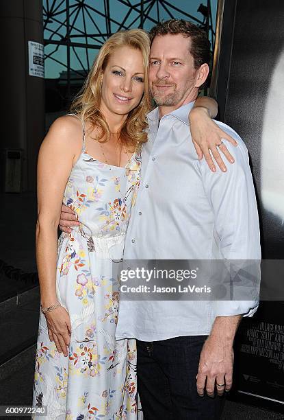 Actress Alison Eastwood and husband Stacy Poitras attend a screening of "Sully" at Directors Guild Of America on September 8, 2016 in Los Angeles,...