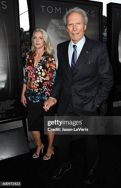 Director Clint Eastwood and Christina Sandera attend a screening of "Sully" at Directors Guild Of America on September 8, 2016 in Los Angeles,...