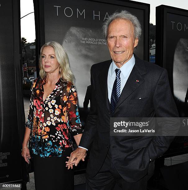 Director Clint Eastwood and Christina Sandera attend a screening of "Sully" at Directors Guild Of America on September 8, 2016 in Los Angeles,...