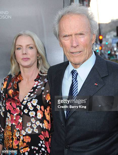 Director Clint Eastwood and Christina Sandera attend the Los Angeles industry screening of Warner Bros. Pictures' 'Sully' at Directors Guild Of...