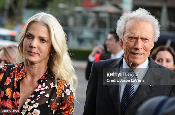 Director Clint Eastwood and Christina Sandera attend a screening of "Sully" at Directors Guild Of America on September 8, 2016 in Los Angeles,...