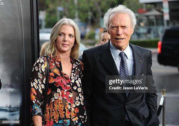 Director Clint Eastwood and Christina Sandera attend a screening of "Sully" at Directors Guild Of America on September 8, 2016 in Los Angeles,...