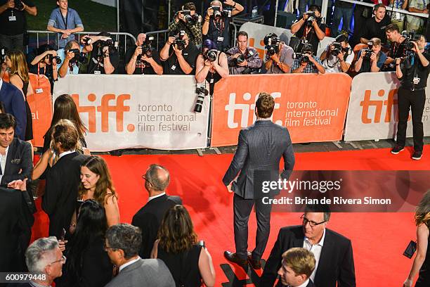 Actor Chris Pratt getting snapped by photographers at 'The Magnificent Seven' premiere during the 2016 Toronto International Film Festival at Roy...