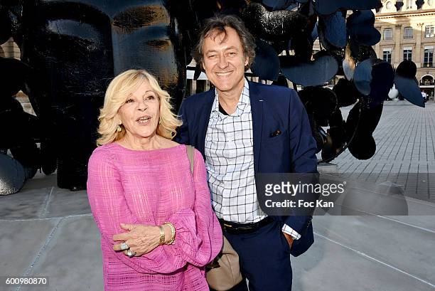 Singer Nicoletta and Jean Christophe Molinier attend the Manolo Valdes Exhibition Preview at Place Vendome on September 8, 2016 in Paris France.