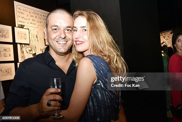 Model Louise Lacoste and Joann Sfar attend the "Joann Sfar-Dali" : Une seconde Avant L'Eveil Exhibition Preview at Musee Salvador Dali on September...