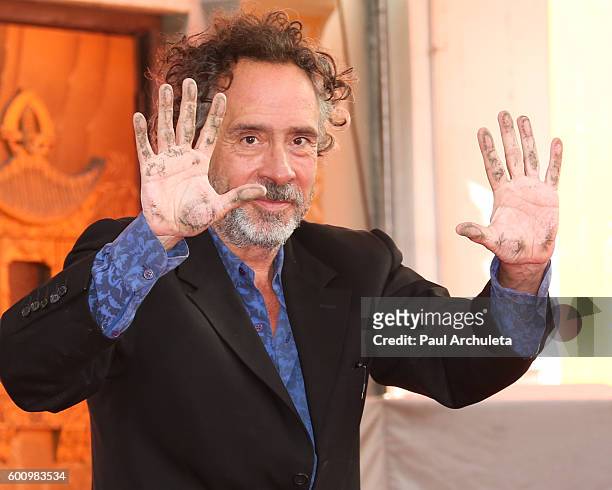 Director Tim Burton attends his hand and footprint ceremony at The TCL Chinese Theatre on September 8, 2016 in Hollywood, California.