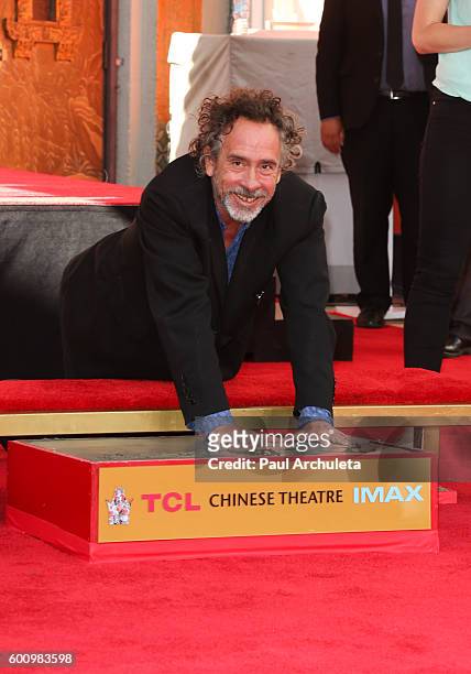 Director Tim Burton attends his hand and footprint ceremony at The TCL Chinese Theatre on September 8, 2016 in Hollywood, California.