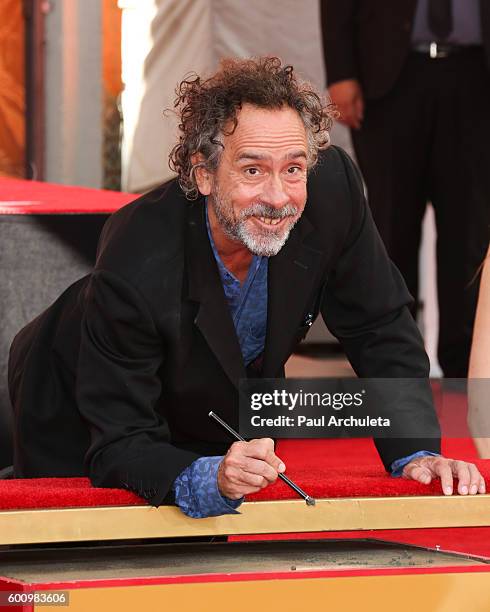 Director Tim Burton attends his hand and footprint ceremony at The TCL Chinese Theatre on September 8, 2016 in Hollywood, California.