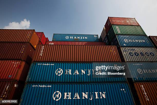 Hanjin Shipping Co. Branded shipping containers sit stacked among other containers at the Hanjin Newport Co. Terminal, a unit of Hanjin Group, at...