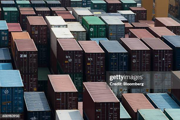 Shipping containers sit stacked at the Hanjin Newport Co. Terminal, a unit of Hanjin Group, at Busan New Port in Busan, South Korea, on Friday, Sept....