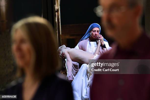 Video installation by U.S artist Bill Viola entitled 'Mary' is seen behind the artist and executive producer, Kira Perov, at St Paul's Cathedral on...