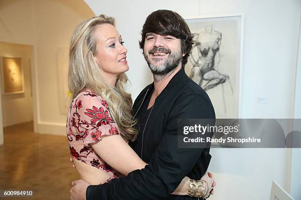 Lorien Haynes and singer/songwriter Cary Brothers attend OTHER Gallery's Los Angeles opening of Lorien Haynes "Have You See Her?" Exhibition on...