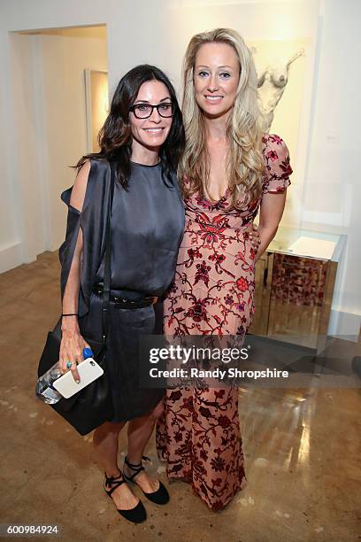 Actress Courteney Cox and Lorien Haynes attend OTHER Gallery's Los Angeles opening of Lorien Haynes "Have You See Her?" Exhibition on September 8,...