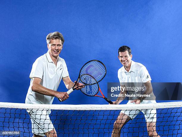 Tennis players and tv presenters Tim Henman and Andrew Castle are photographed for the Daily Mail on June 9, 2016 in London, England.