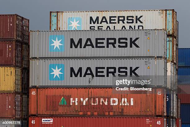 Moeller-Maersk A/S branded shipping containers sit stacked at a container terminal at Busan New Port in Busan, South Korea, on Friday, Sept. 9, 2016....