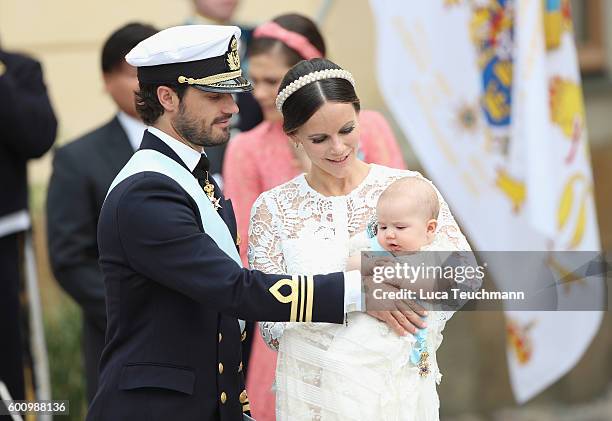 Prince Carl Philip of Sweden, Princess Sofia of Sweden and their son Prince Alexander attend the christening of Prince Alexander of Sweden at...