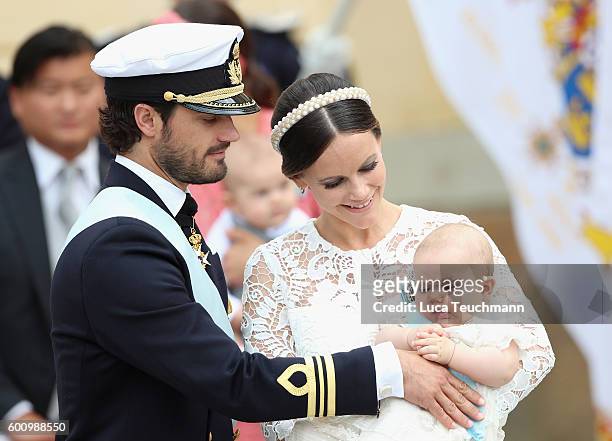 Prince Carl Philip of Sweden, Princess Sofia of Sweden and their son Prince Alexander attend the christening of Prince Alexander of Sweden at...